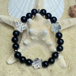 Beaded bracelet - black obsidian beads with silver tone paw beads